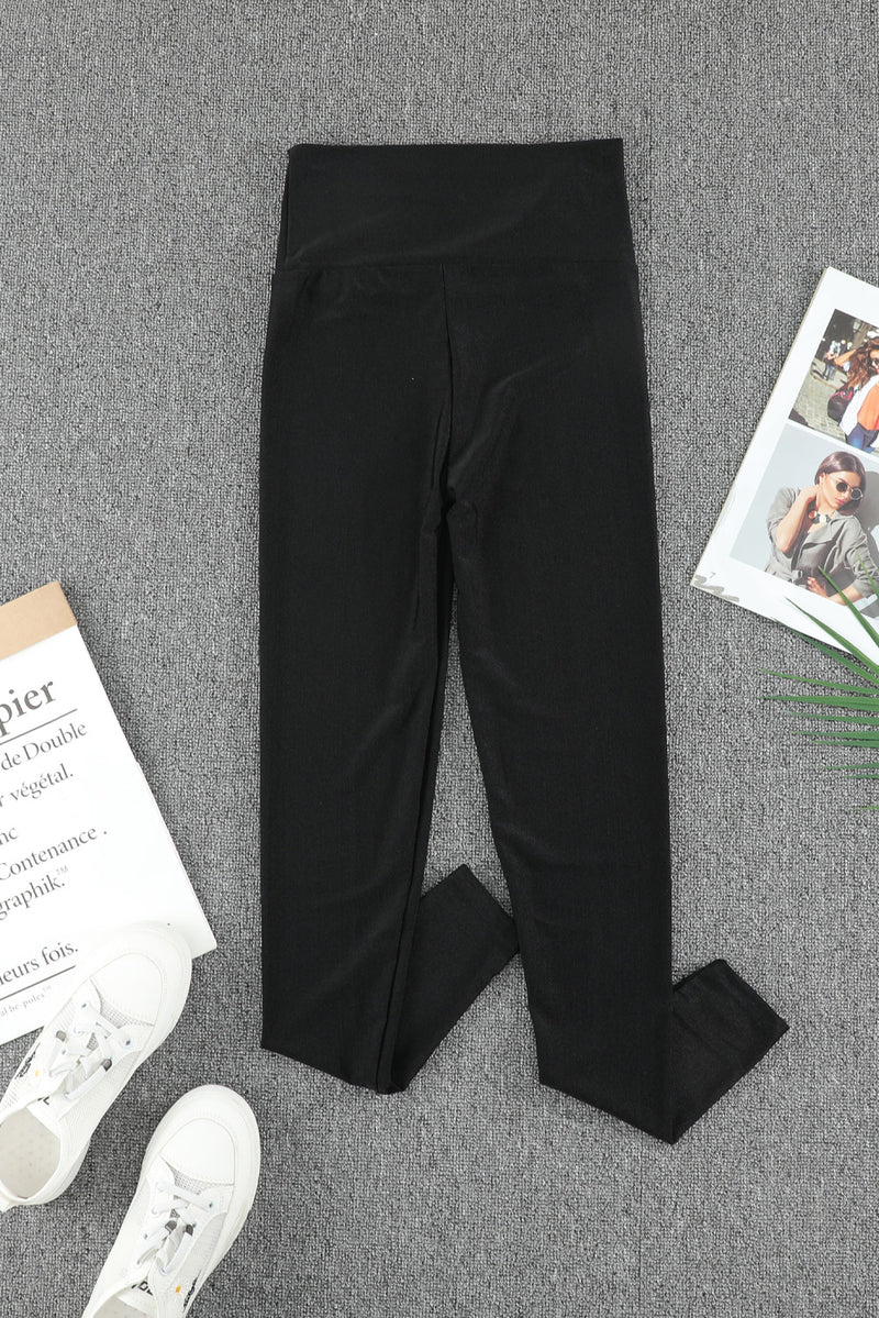 Schwarze enge Leggings mit hohem Bund und Taillenmieder