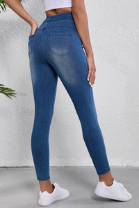 Marineblaue, schmale, knöchellange Jeggings mit mittlerer Taille und elastischem Bund und Taschen