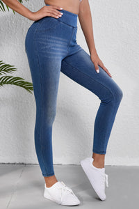 Marineblaue, schmale, knöchellange Jeggings mit mittlerer Taille und elastischem Bund und Taschen