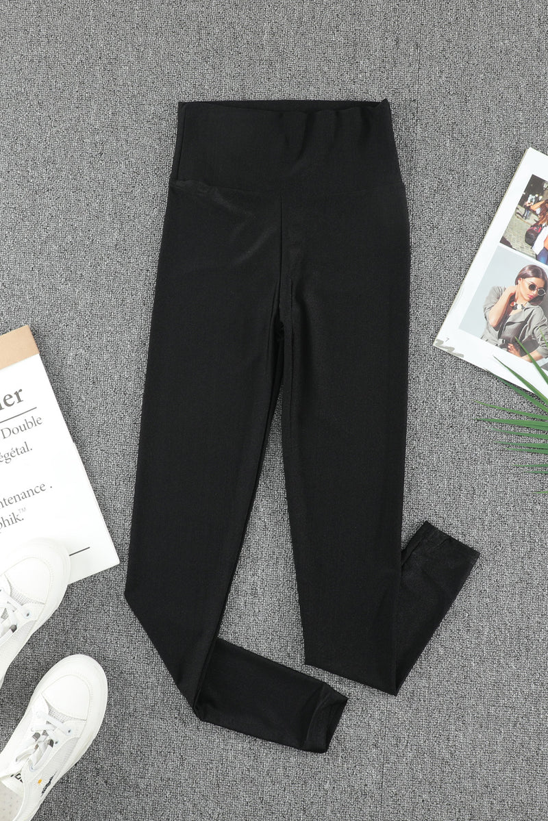 Schwarze enge Leggings mit hohem Bund und Taillenmieder